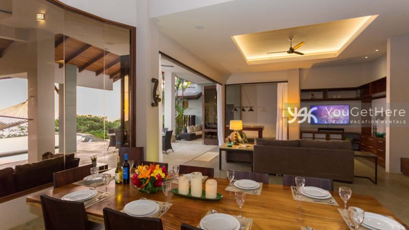 Jade House Luxury spacious outdoor/Indoor floor plan with disappearing slider between living room and pool deck.