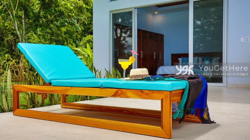 Lounge chair outside of guest bedroom at Villa Oro Verde Costa Rica.