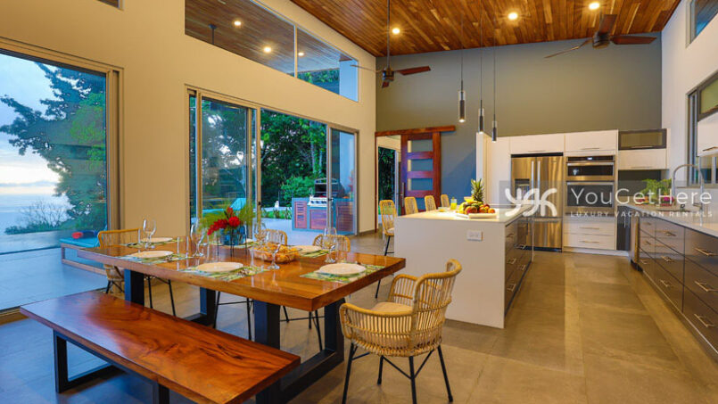 Open space kitchen and dining area at Villa Oro Verde Luxury Ocean View Vacation Home.