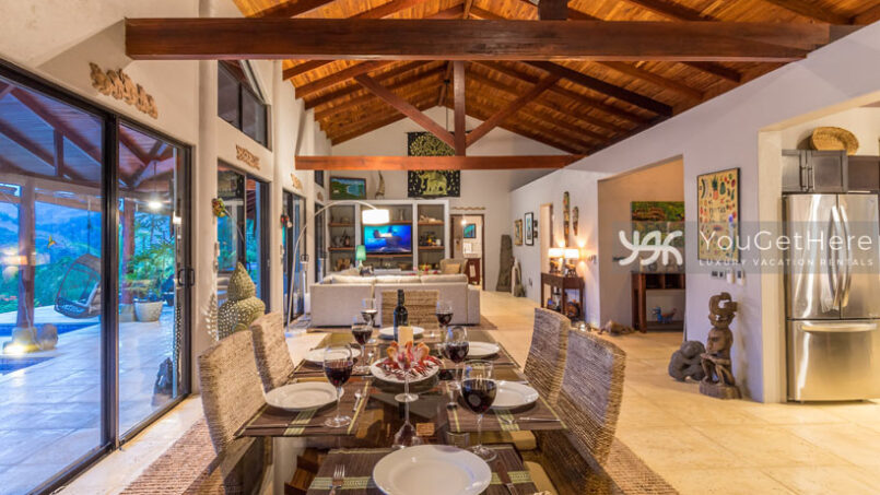 Villa Koora Indoor dining area with table set for six.