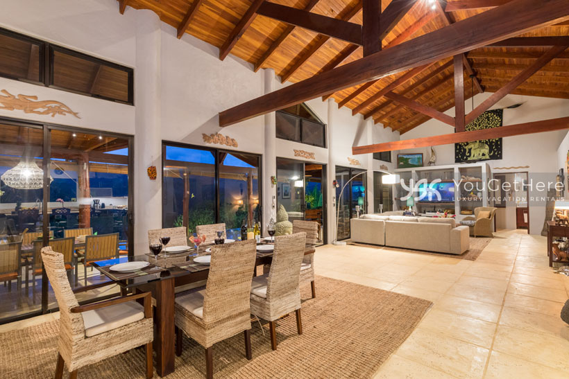Beautifully designed vaulted wood ceiling beams over large open living space at Villa Koora Costa Rica.