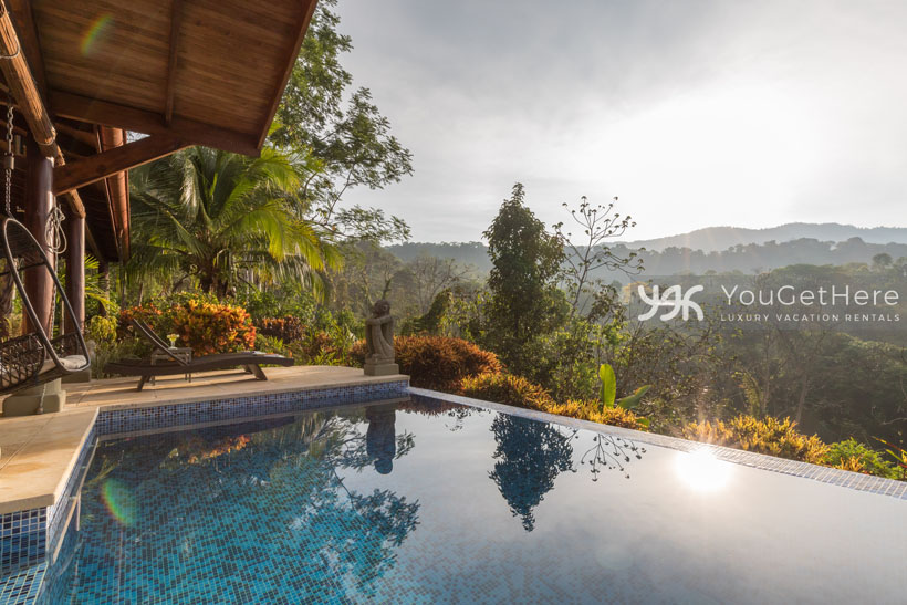 Lush green jungle views around the pool at Villa Koora Costa Rica.