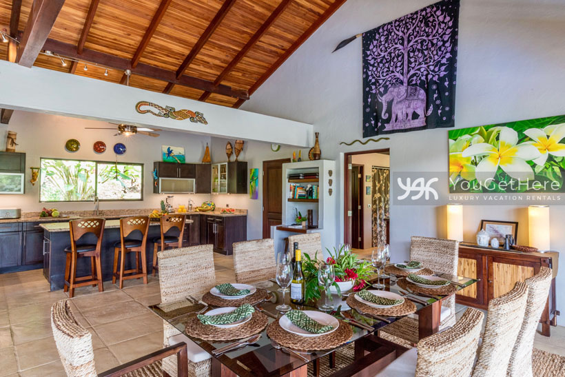Villa Koora vacation rental living space is brightly decorated with local art.