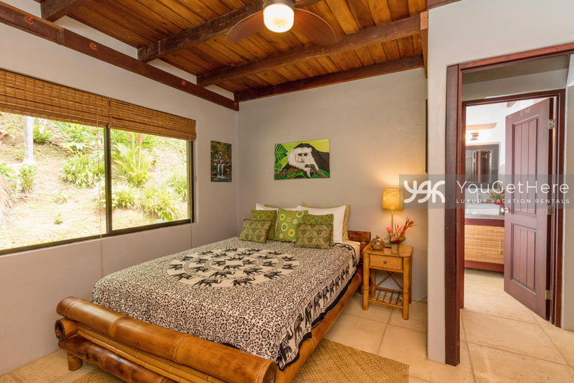 Villa Koora vacation rental guest bedroom with ensuite bath.
