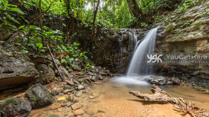 Beautiful natural waterfall and creek next to Villa Koora Costa Rica.