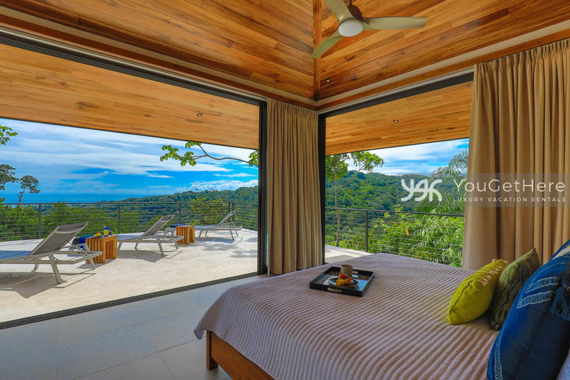 Ocean view from primary bedroom at luxury vacation home Villa Dalu.