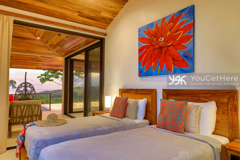 Bight and colorful decor and art adorn the bedrooms at Villa Dalu Costa Rica.