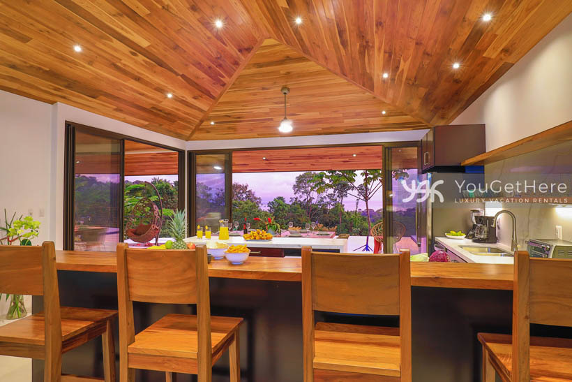 Beautiful custom ceiling and lighting over living space and kitchen at Villa Dalu Costa Rica.