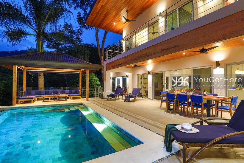 Lighted pool and deck at Tulu Azul luxury villa in Costa Rica.