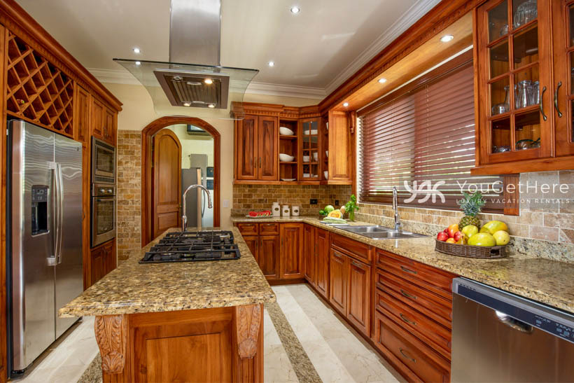 Vista Encanto Costa Rica Modern kitchen with huge stovetop, over-size refrigerator.