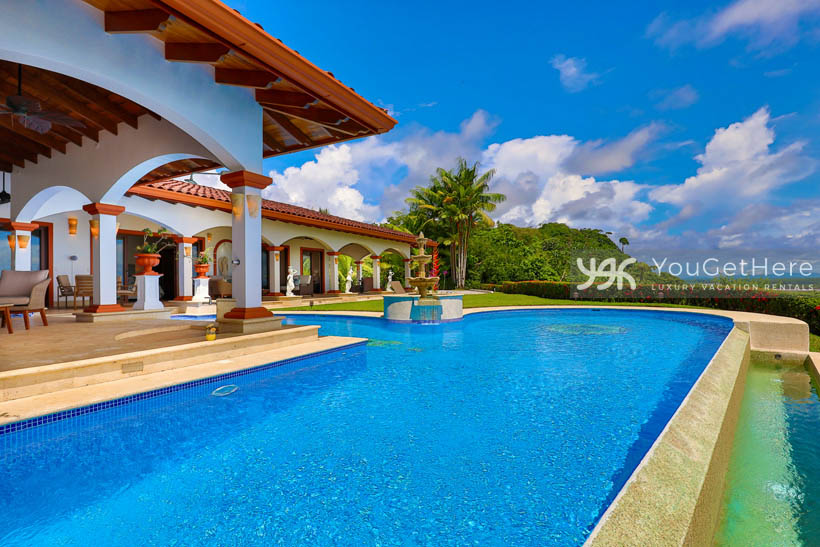 Vista Encanto Costa Rica massive swimming pool with fountain, soaking tub and huge outdoor shaded patio.
