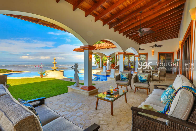 Ample comfortable seating under covered patio at Vista Encanto Costa Rica.