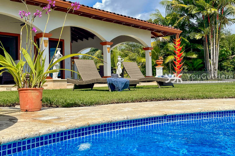 Beautifully landscaped pool surroundings at Vista Encanto Costa Rica.