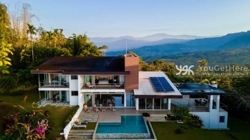 Aerial view of entire Meridian House Costa Rica with huge living spaces and green backyard and pool.