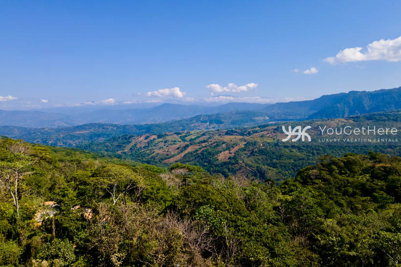 Beautiful green jungle and mountains in the distance at Meridian House Costa Rica