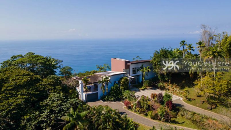 Aerial view of Meridian House Costa Rica surrounded by lush jungle landscaping and full ocean views.