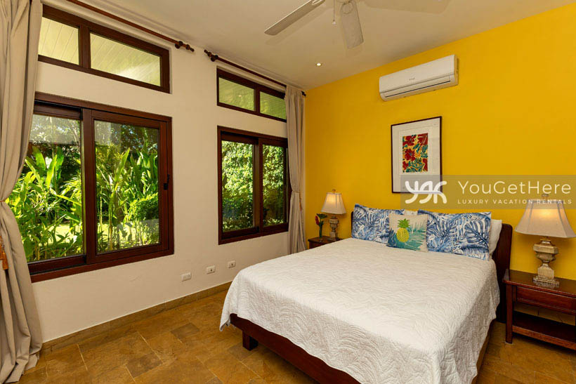 Caballitos del Mar Norte vacation villa bright guest bedroom decor.