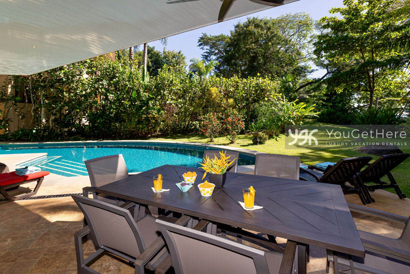 Beachfront vacation villa Caballitos del Mar Norte Pool Deck with Grass Area for Kids to play.
