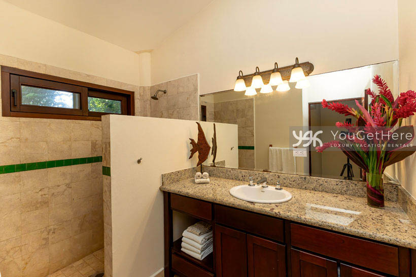 Caballitos del Mar Norte guest bath in luxury beachfront vacation home.