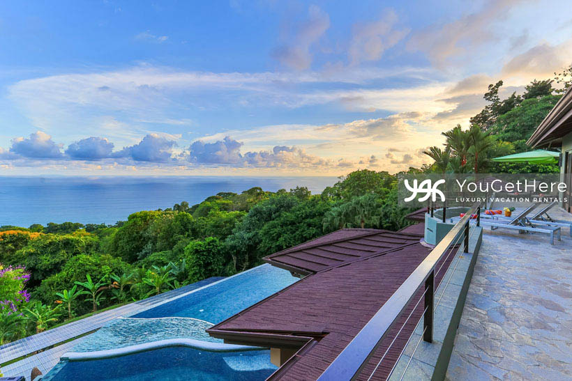 Jade House Costa Rica aerial view of upstairs full deck featuring lounge chairs with incredible ocean views.