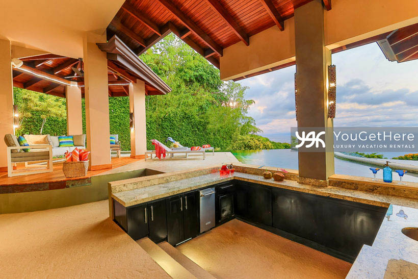 Jade House Costa Rica outdoor kitchen with wine fridge and tons of counter space to prepare tropical cocktails or mocktails.