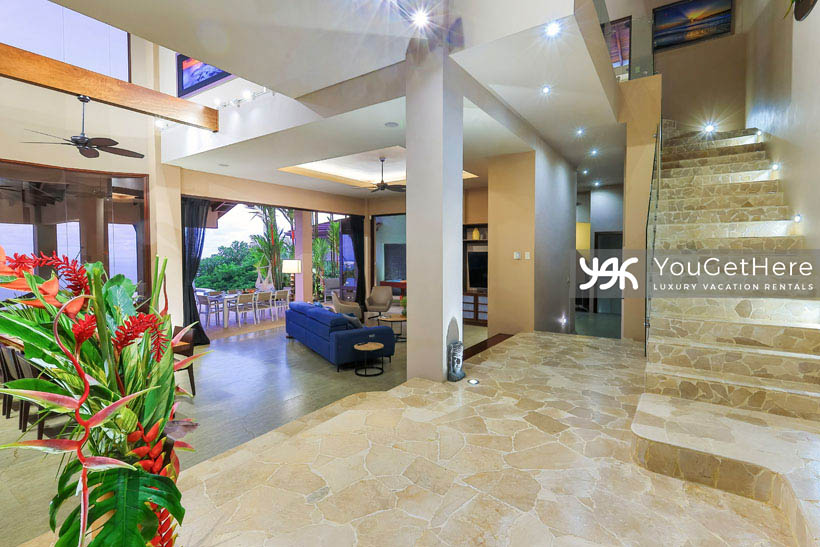 Jade House Costa Rica beautiful stone floors and inset lighting in stone stairwell leading to guest suites.