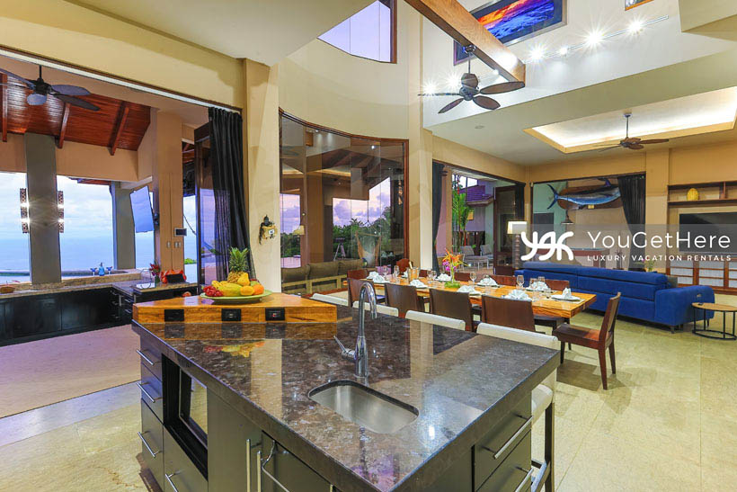Jade House Costa Rica immaculate kitchen, dining and living area with stunning ocean views throughout.