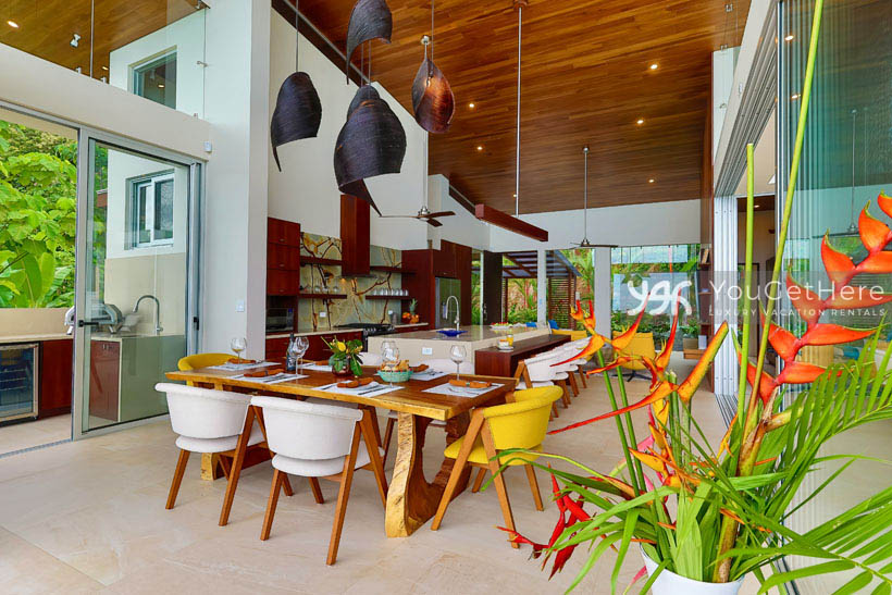 Brightly colored interior design and custom woodwork throughout upscale Costa Rica luxury vacation rental.