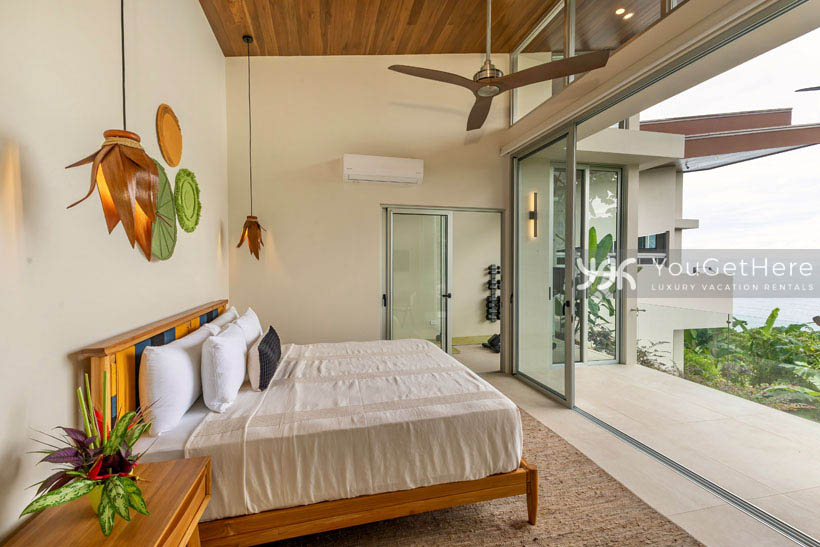 Costa Rica Vacation rental with exercise room equipped with cardio machine and free weights off of guest suite with ocean-views.